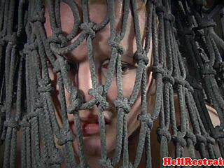 Bound submissive suspended by maledom master in rough bdsm session