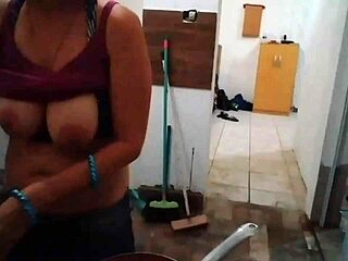 Stella, the busty cook, in all her glory in a red dress