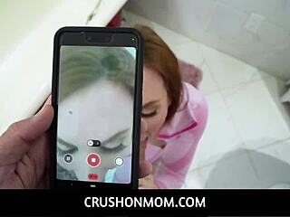 Big tits redhead MILF stepmom Sophia Locke and stepson make POV video together with handjob and nude pussy.