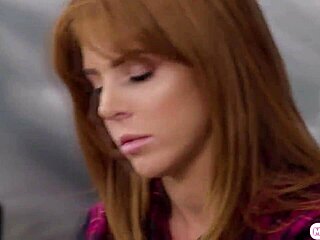 Redhead babe licks ebony client's pussy