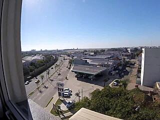 Watch Sarada naked in the hotel window overlooking the airport