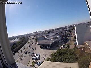 Watch Sarada naked in the hotel window overlooking the airport