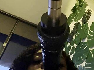 Amateur gay black's solo masturbation scene with a throat training toy