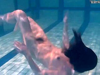 Ivetta plays seductively in pool, drawing all eyes