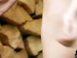 tiny teen model strips naked outdoor by woodpile