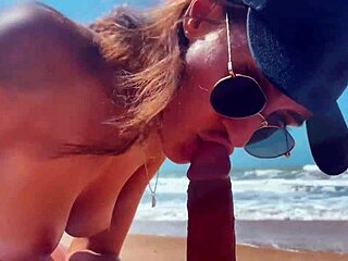 Beauty teen in cap gives super POV blowjob on nude beach