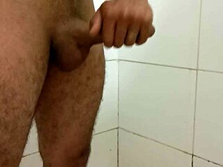 Skinny guy with a big dick masturbates with a rotating sex toy