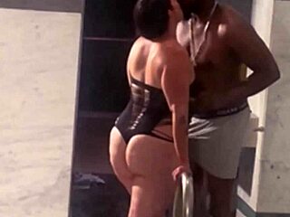 Big black cock cums on tits in steamy night club