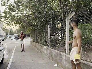 Interracial gay couple enjoys outdoor sex with bodybuilder