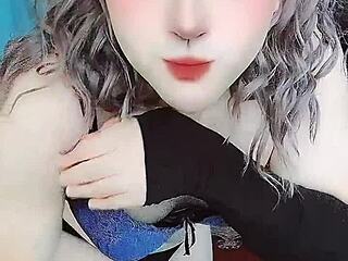 I am a crossdresser shemale riding in cowgirl on webcam.