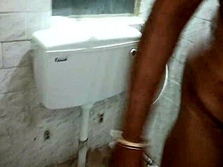 Black Indian lady sucks cock in bathroom with passion