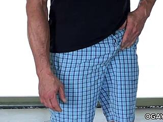 Young and old gay couple having sex