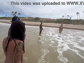 Beautiful latina nerd engages in lesbian sex on beach watched by everyone