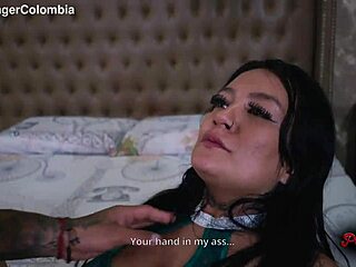 alexa lewis and danyel mast in room with intense physical activity and large figures