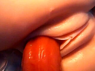 Real doll takes double penetration in both holes with toys close up