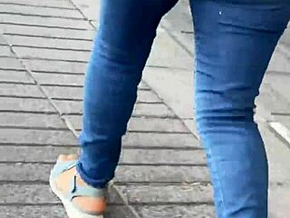 Curvy latina looks stunning in tight jeans at the party