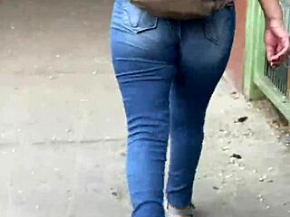 Curvy latina looks stunning in tight jeans at the party