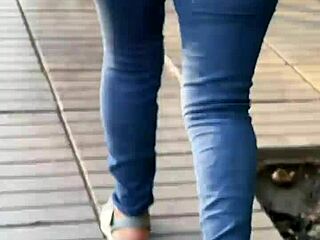 Curvy latina looks stunning in tight jeans at the party