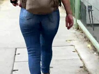 Curvy latina looks stunning in tight jeans at the party