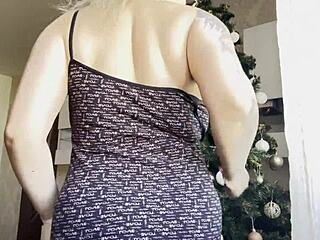 big tits blonde masturbates near christmas tree