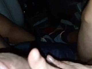asian babe giving handjob to big black cock