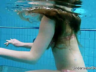Wow, sexy girl flaunts stunning young body underwater! 🏊‍♀️