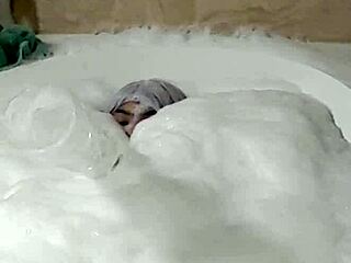 Cyno enjoys solo bubble bath fun in cosplay