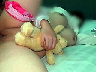 Pretty Asian teen with big tits bent over in doggystyle