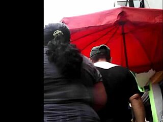Peruvian woman excitedly does her shopping in the market