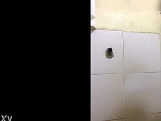 I am in the bathroom wearing a short skirt.