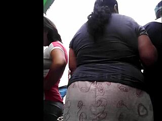 Peruvian woman excitedly does her shopping in the market