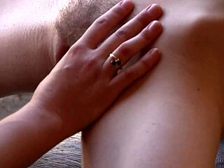 brunette lesbians get naughty by the barn in steamy action