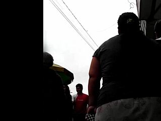Peruvian woman excitedly does her shopping in the market