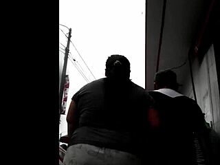 Peruvian woman excitedly does her shopping in the market