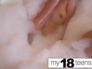 watch this 18+ teen babe fingering her pussy in the bath until she orgasms in close up