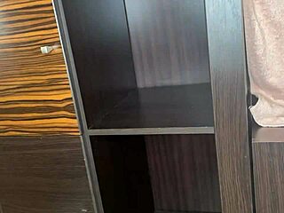 Enjoy a close-up of feet in black stockings using toys on the homemade bed.