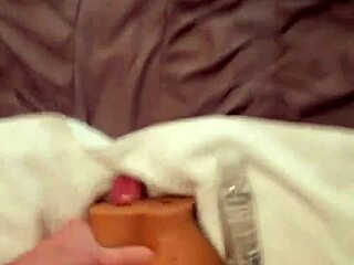 Mac Brampton takes his homemade fuck doll and unleashes a massive cum load on her ass