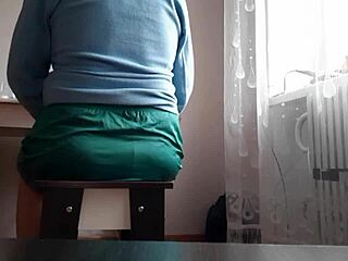 Secretary eases tension with solo play at office. Does she get caught?