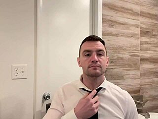 Behind the scenes, muscular brunette bodybuilder prepares for porn shoot with solo fingering and backstage insights in English.