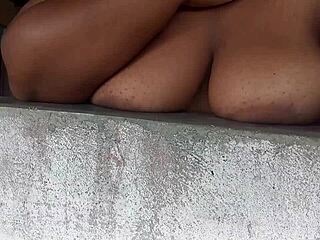 latina flashing guys from window