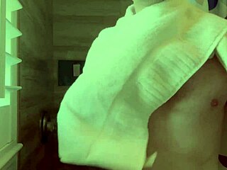 Behind the scenes, muscular brunette bodybuilder prepares for porn shoot with solo fingering and backstage insights in English.