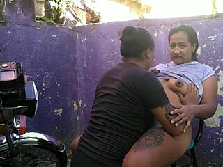 Wow! Lesbian sex at outdoor bike wash ends in creamy orgasm!