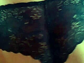 The model dances seductively in blue marine lace panties