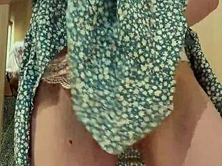 I got caught trying on a cute dress, showing my plump ass and big natural tits