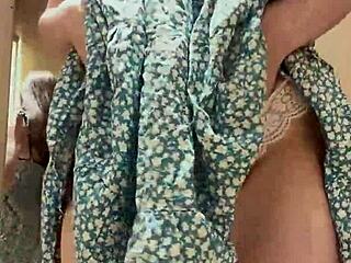 I got caught trying on a cute dress, showing my plump ass and big natural tits