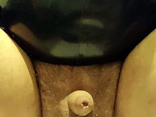 Latexi69 Teases with Butt Plug in Tight Latex