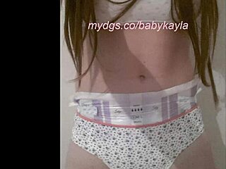Teen 18+ lover appears in a wet diaper slideshow featuring girl Kayla.
