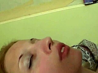 Caregiver Plays With Cat On Ward