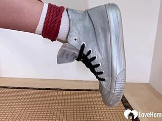 bound brunette girlfriend gags deeply in kinky bondage session