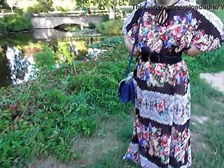 hairy mature woman flashing in the park under skirt.